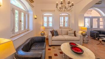 Superior Villa | Living area | Flat-screen TV