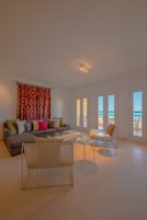 Luxury Apartment | Living area | Flat-screen TV