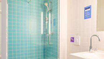 Quadruple Duplex Room | Bathroom | Shower, towels