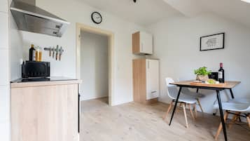 City Apartment, 2 Bedrooms | Private kitchen | Fridge, coffee/tea maker, highchair, cleaning supplies