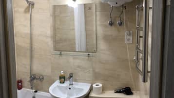 Comfort Apartment | Bathroom | Hair dryer, slippers, towels, soap