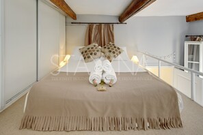 1 slaapkamer, een strijkplank/strijkijzer, wifi, beddengoed