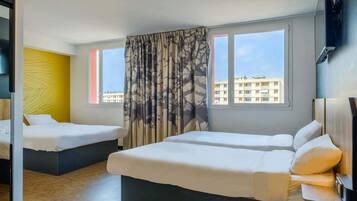 Quadruple Room | Premium bedding, desk, laptop workspace, blackout drapes