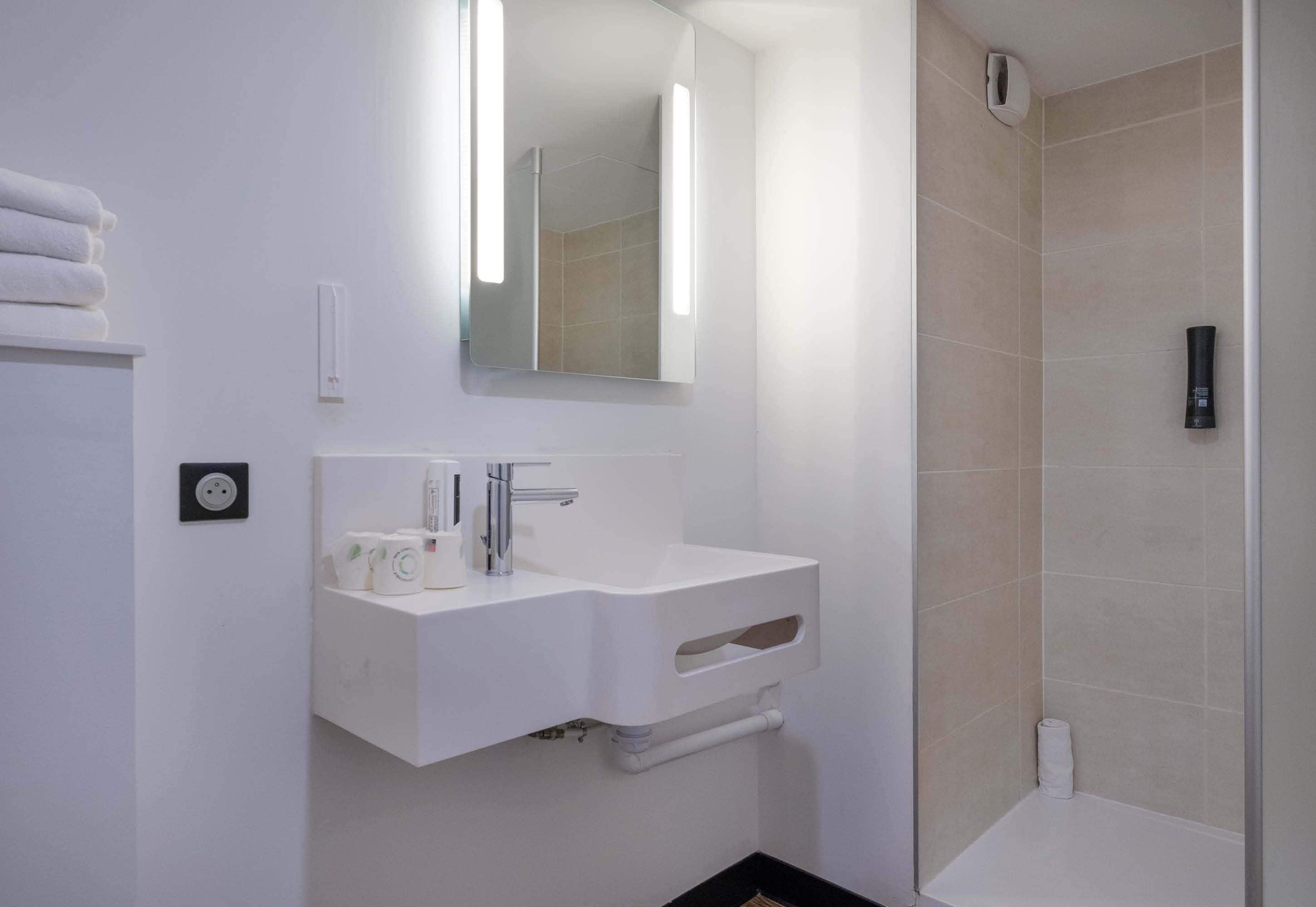 shower, towels, soap, toilet paper