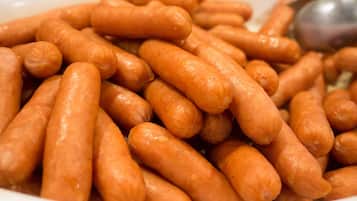A bowl of sausages.