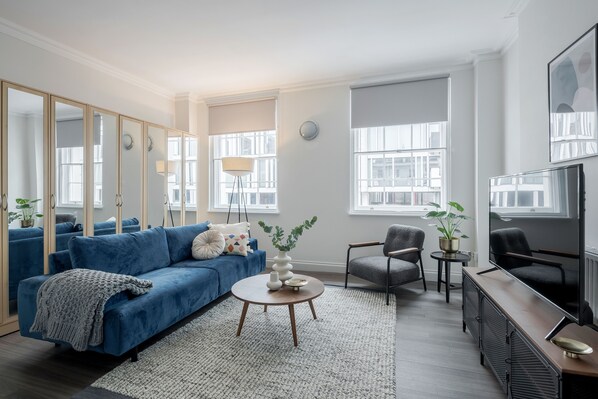 Deluxe Apartment | Living room | Smart TV