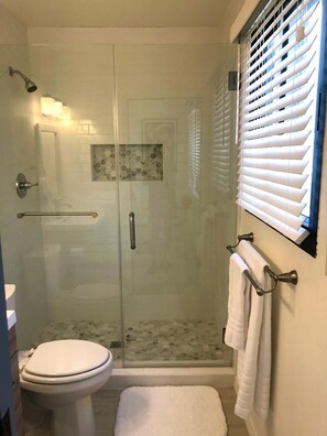 Shower, hair dryer, towels, soap