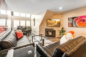 Smart TV, fireplace, books