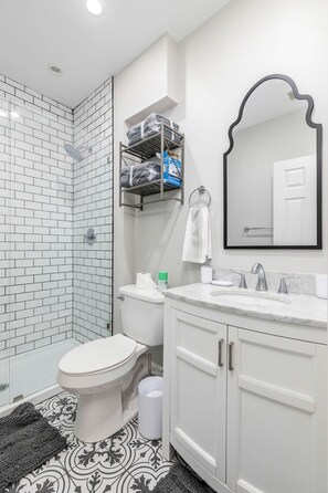 Shower, towels, soap, shampoo