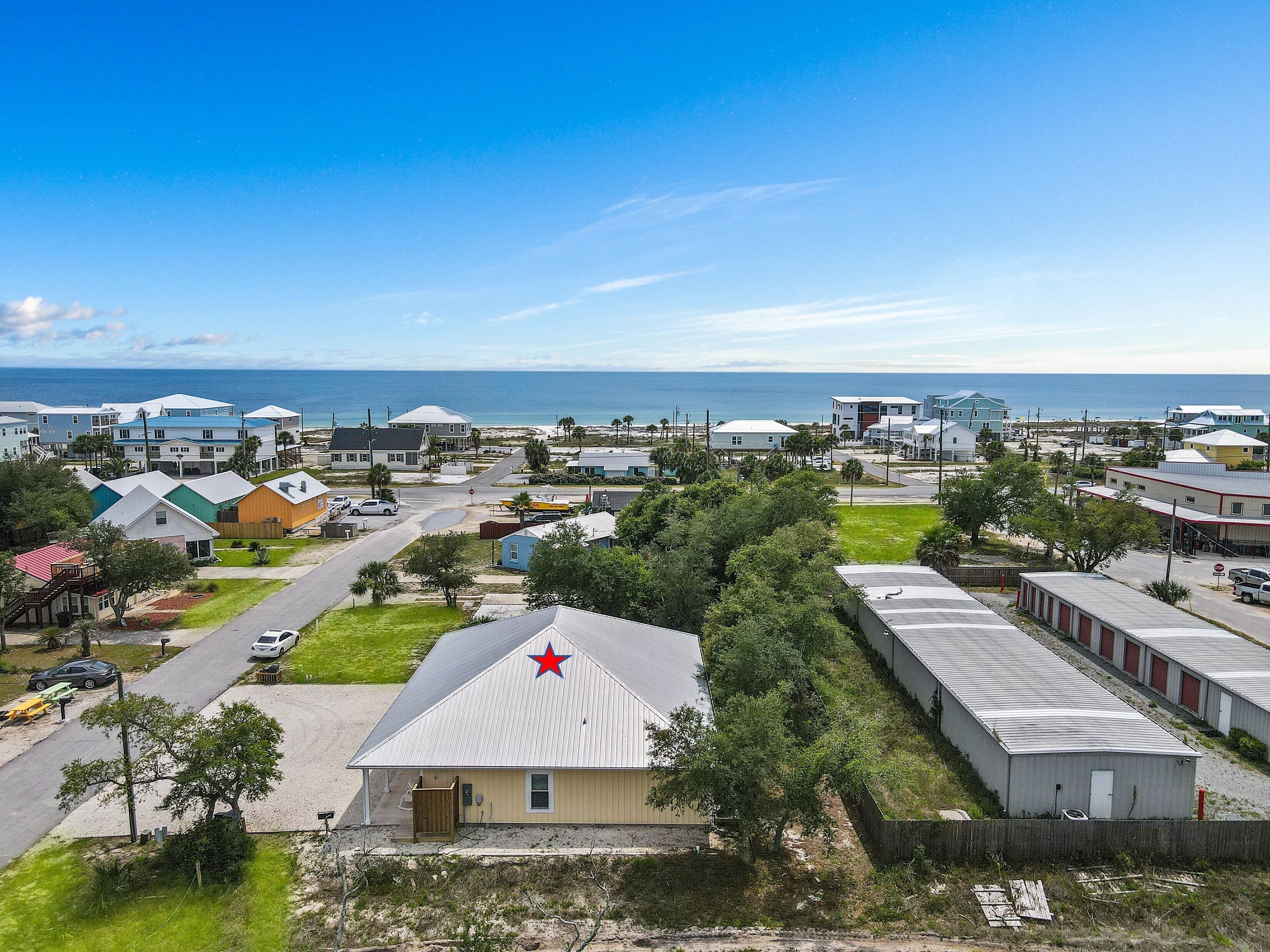 JUST A BREEZE AWAY IS A MODERN 3BD SINGLE LEVEL! STEPS FROM BEACH, RESTAURANTS! BOAT PARKING!