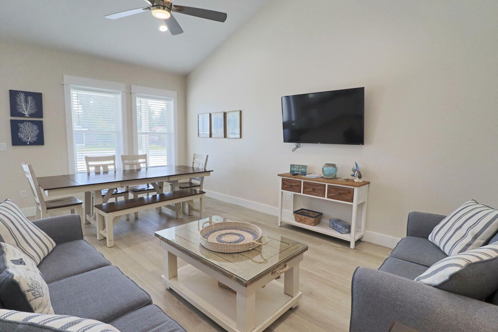 JUST A BREEZE AWAY IS A MODERN 3BD SINGLE LEVEL! STEPS FROM BEACH, RESTAURANTS! BOAT PARKING!