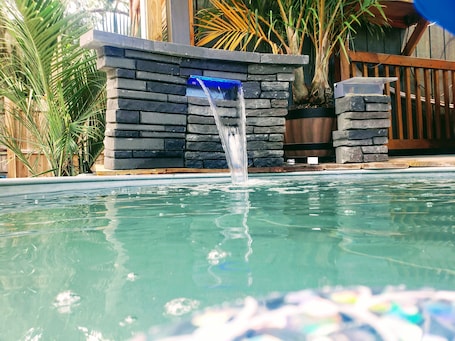 Outdoor pool. Tiny House , Big Vibes Illuminated Backyard Escape