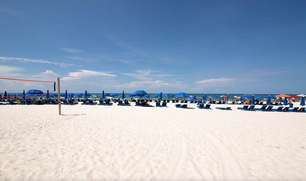 On the beach, sun-loungers, beach towels