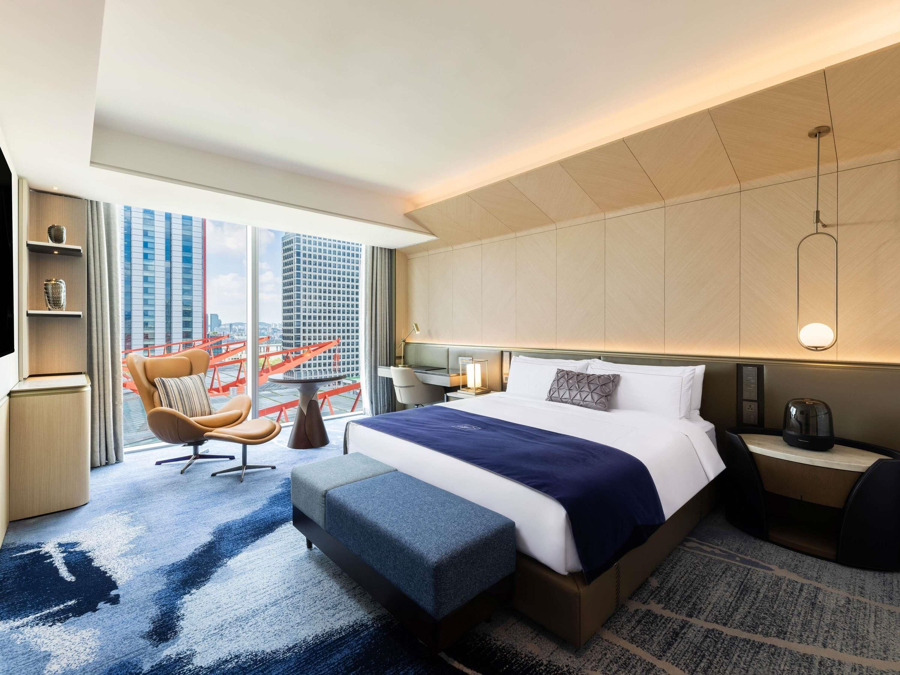 Premier Suite, 2 Bedrooms, 1 King Bed and 2 Single Beds, Panorama View | Down duvets, minibar, in-room safe, desk