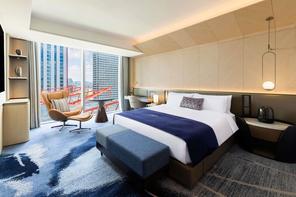 Premier Suite, 2 Bedrooms, 1 King Bed and 2 Single Beds, Panorama View | Down comforters, minibar, in-room safe, desk