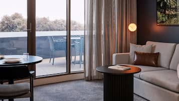 Apartamento ejecutivo, 1 habitación (Courtyard) | Zona de estar | Una televisión de pantalla plana, Netflix, servicios de streaming