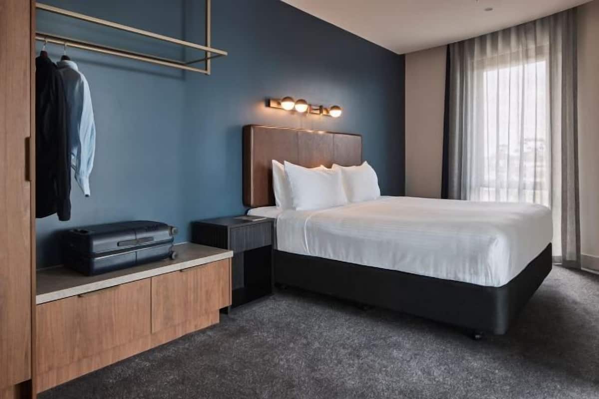 Premium-sengetøj, senge med topmadrasser, minibar, pengeskab på værelset