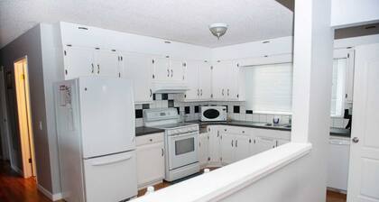 Simply beautiful and comfortable main suite with a view.