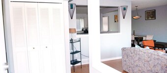 Simply beautiful and comfortable main suite with a view.