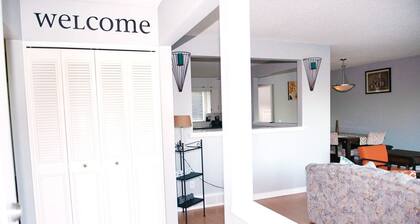 Simply beautiful and comfortable main suite with a view.