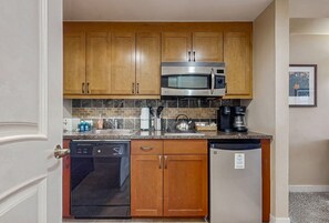 Microwave, stovetop, dishwasher, coffee/tea maker