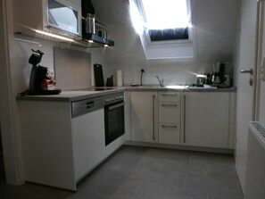 Fridge, oven, dishwasher, high chair