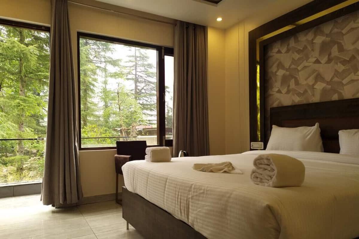Frette Italian sheets, premium bedding, desk, laptop workspace