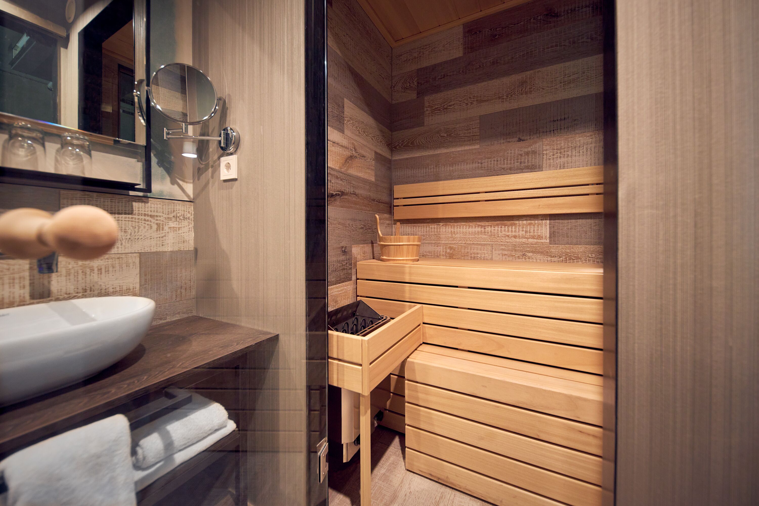 wellness suite | bathroom amenities | free toiletries, hair dryer, towels, soap