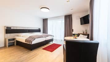 Premium bedding, down duvets, free minibar, in-room safe