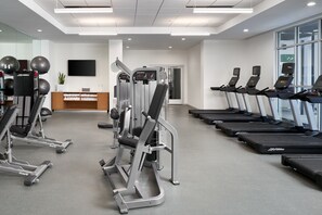 A modern gym with treadmills, weight machines, and exercise balls. - Element by Marriott Orlando at SeaWorld (Orlando)