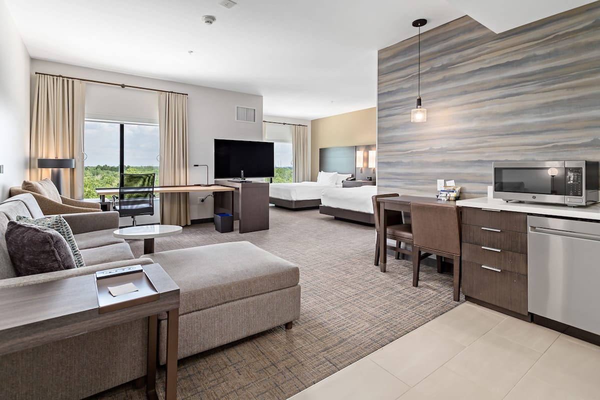 studio, multiple beds, non smoking | living area | flat-screen tv