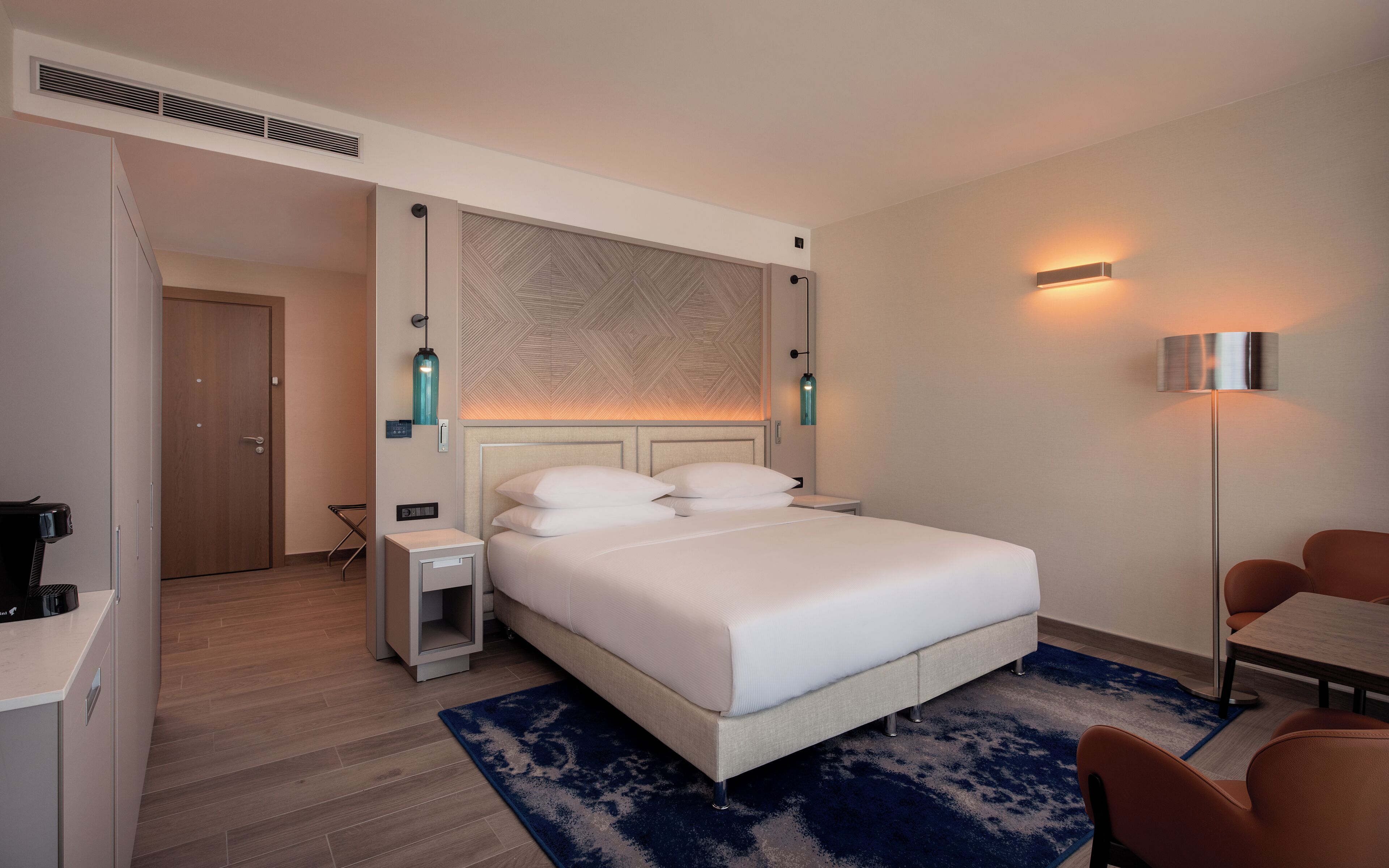 Hypo-allergenic bedding, minibar, in-room safe, laptop workspace