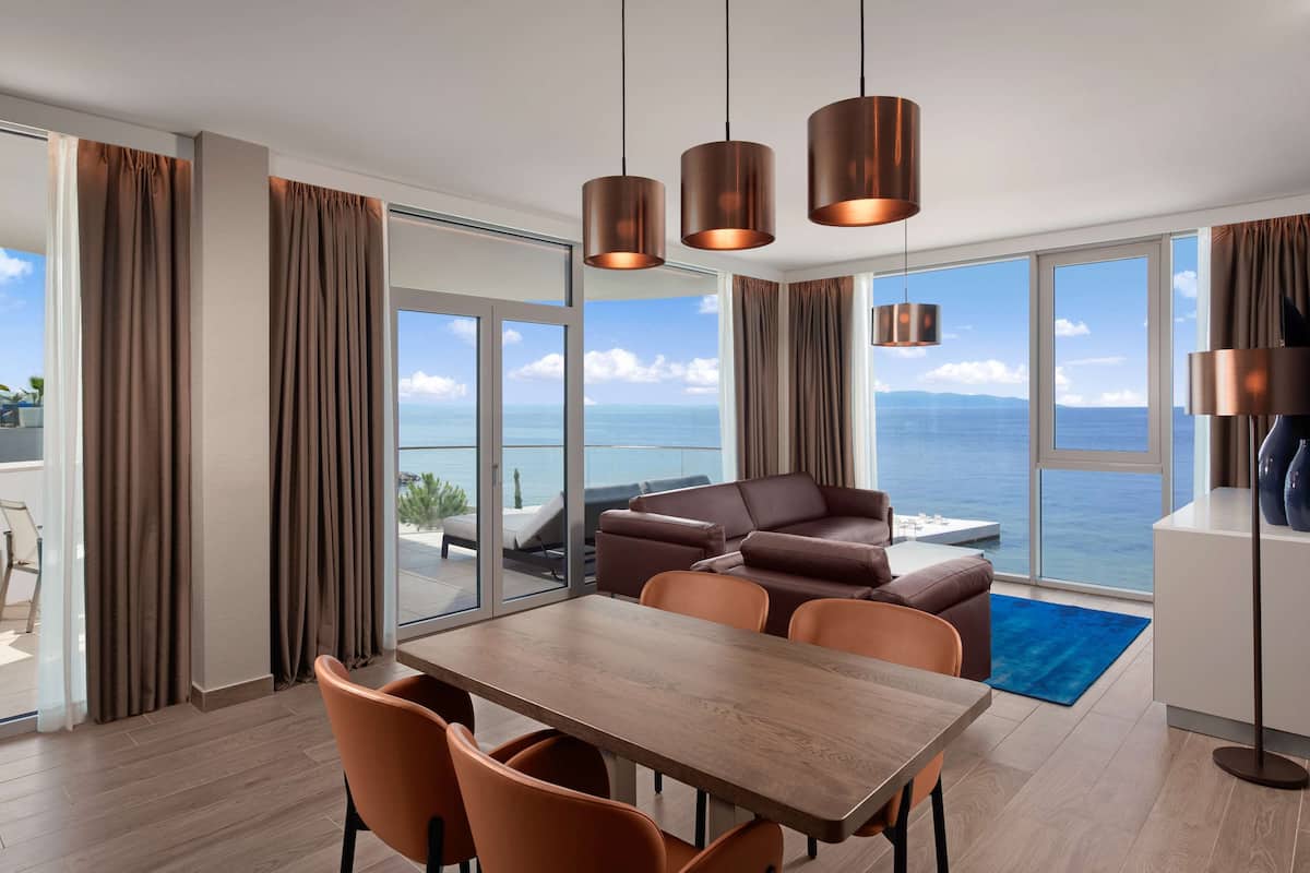 Deluxe Suite, 1 Bedroom (Beach) | Living area | 55-inch flat-screen TV with cable channels, TV