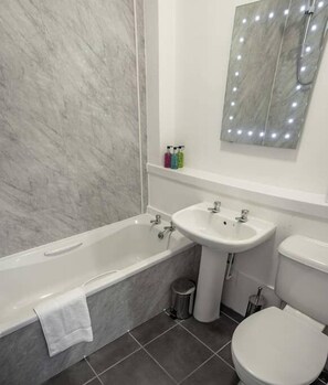 Bathtub, hair dryer