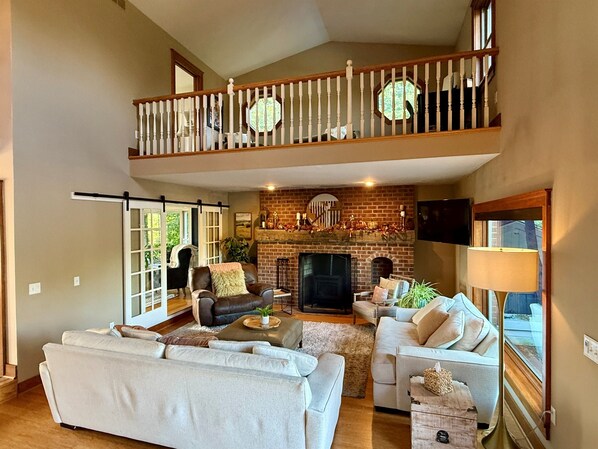 Smart TV, fireplace, DVD player, foosball