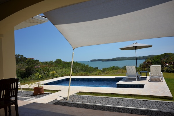 Possible boat trips to many islands can be done from the beach below .