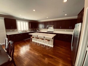 Fridge, oven, cookware/dishes/utensils