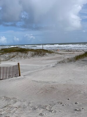 On the beach, sun-loungers