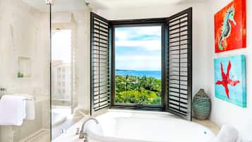 Bathtub, hair dryer, towels, soap