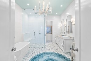 Bathtub, hair dryer, towels