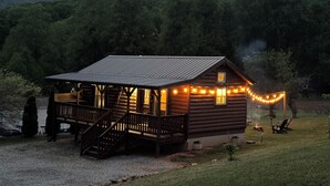 A wooden cabin with a porch, a staircase, and a fire pit. - Turkey Trot- New Cabin in Black Mountain w/ views & discount Biltmore tickets! (Black Mountain)