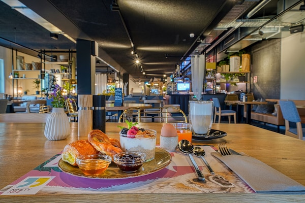 Daily buffet breakfast (EUR 17.9 per person)