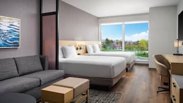 Hypo-allergenic bedding, down comforters, pillowtop beds, in-room safe