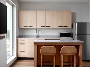 Suite, 1 King Bed with Sofa bed | Private kitchen | Coffee/tea maker