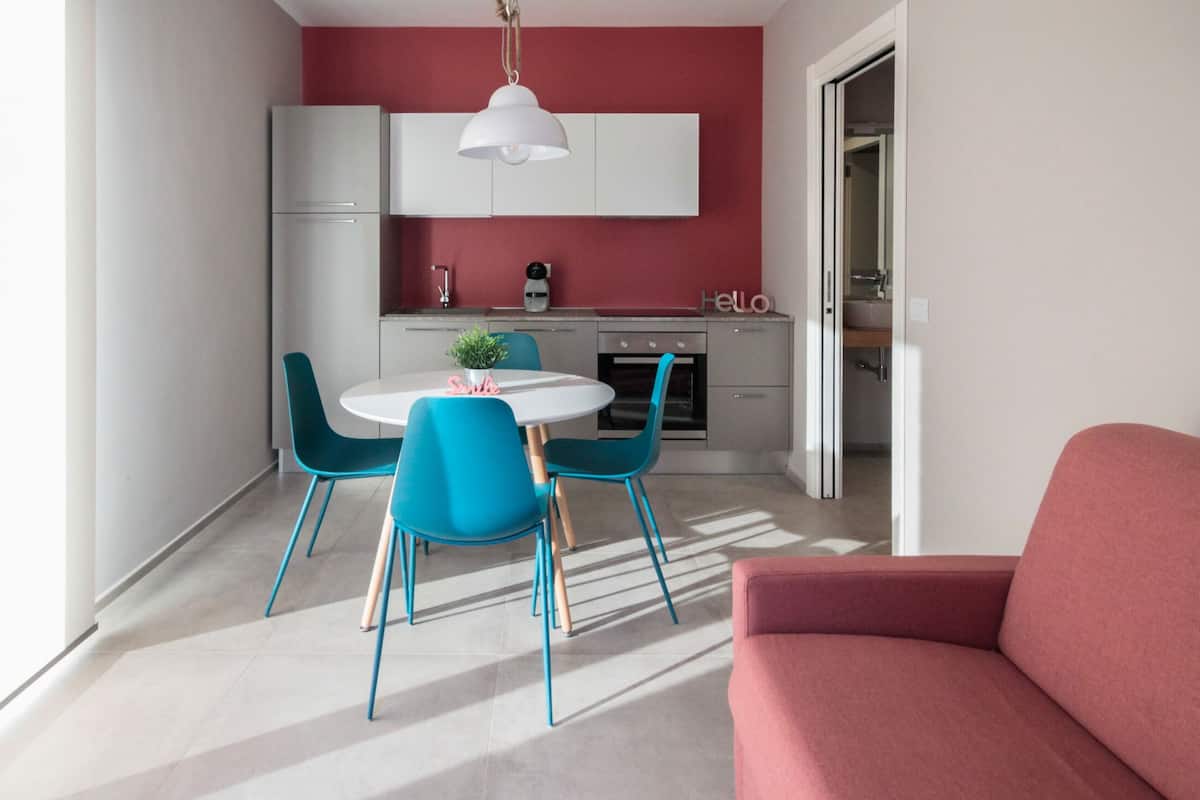 Appartement, 1 slaapkamer, uitzicht op binnenplaats (Levante) | Woonruimte | Een 32-inch televisie met digitale zenders