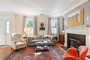 Smart TV, fireplace, books