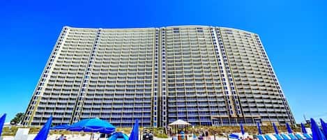 On the beach, sun-loungers, beach towels