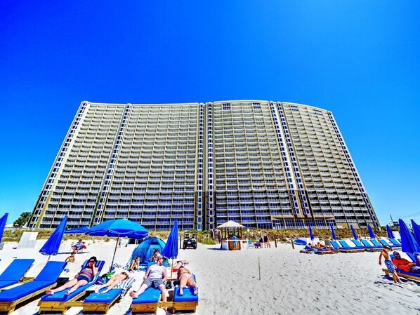 On the beach, sun-loungers, beach towels