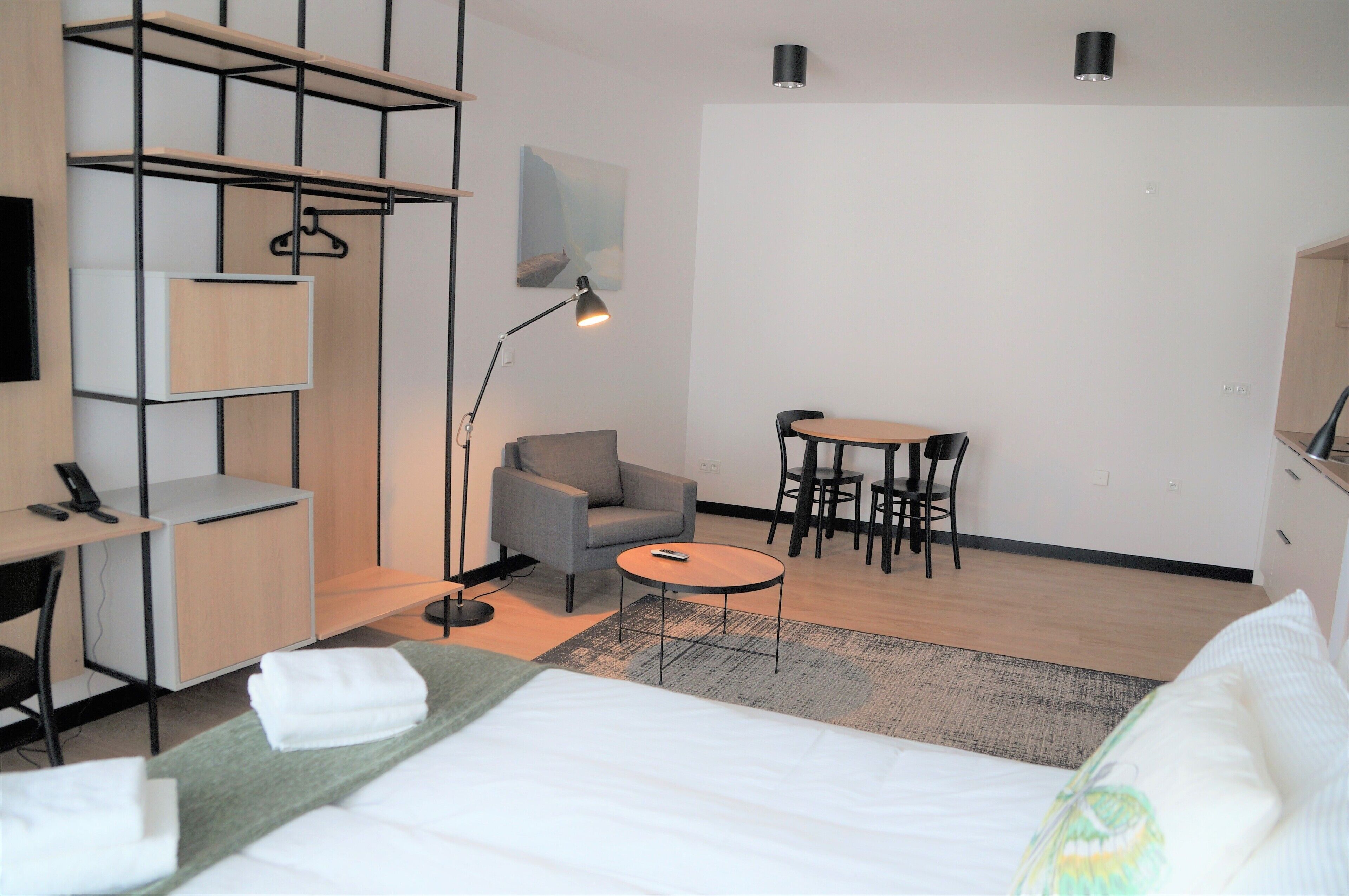 studio, 1 queen bed | living area | lcd tv