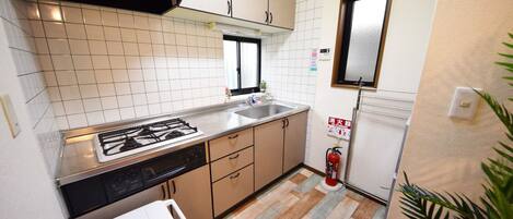 Fridge, microwave, stovetop, cookware/dishes/utensils